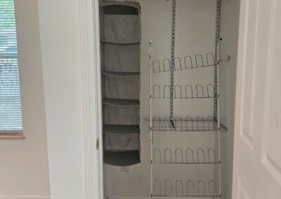 Interior closet space featuring organized shelving and storage solutions, ideal for maximizing space in a newly renovated duplex in Midtown Little Rock.